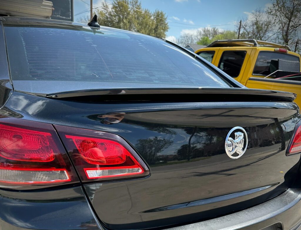 black car trunk repair